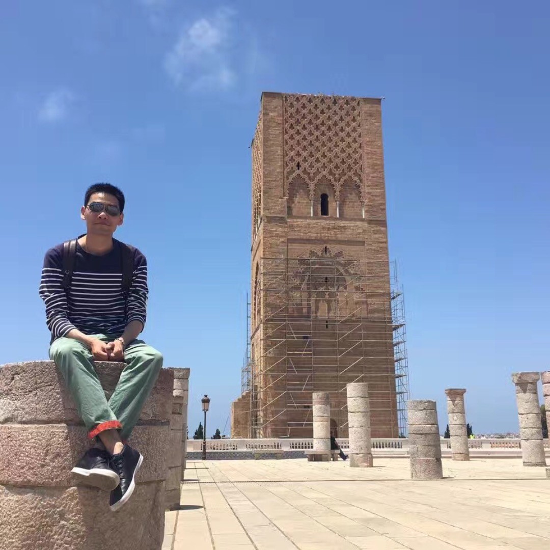 Traveler visiting Hassan Tower in Rabat, Morocco